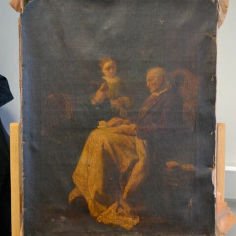 Before restoration of oil painting on a pillowacase