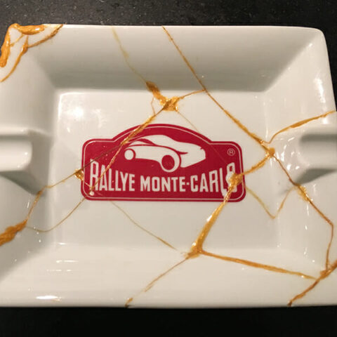 Badly mended ash tray prior to restoration
