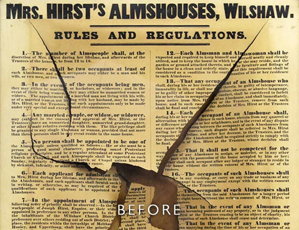 Before restoration of tear repair on printed artwork