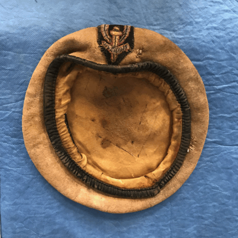 Military beret before restoration
