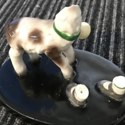 broken figurine of child and lamb