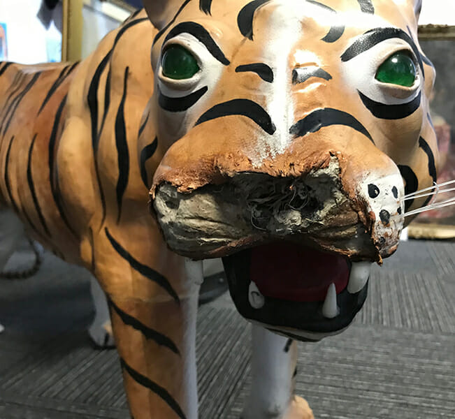 Restoration of a papiermâché tiger Fine Art Restoration Company