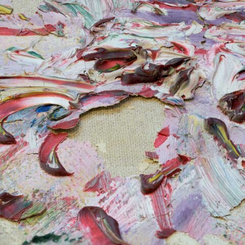 Detail of flaking chipped paint - the way artwork is created can create problems