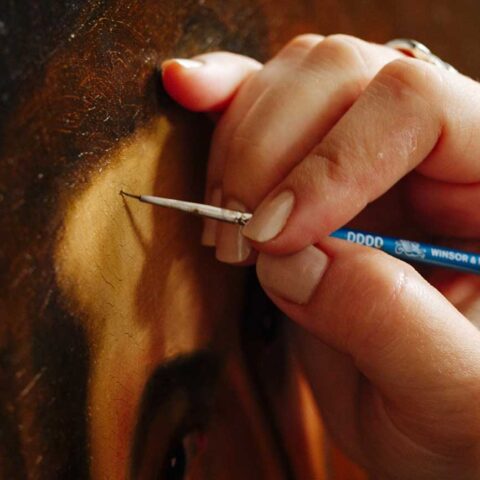 Close up of retouching with pigments