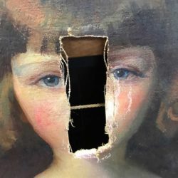 A dramatic rip through an oil painting of the face of a child