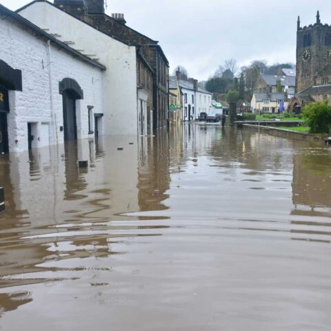 flooded road and houses featured image