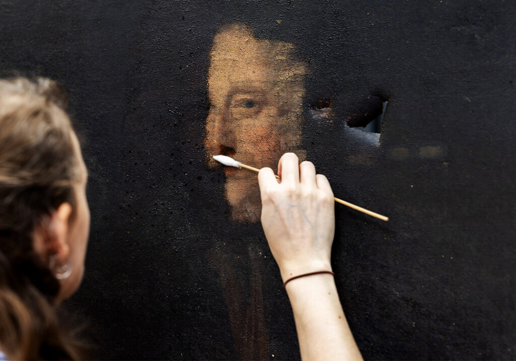 Fire damaged painting clean