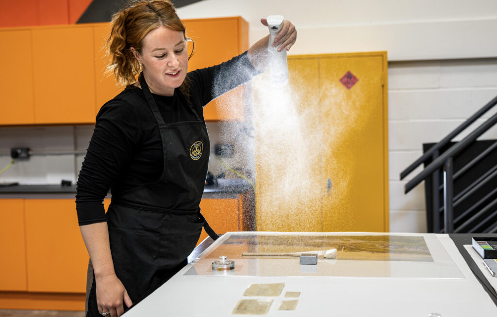 Conservator cleaning paper