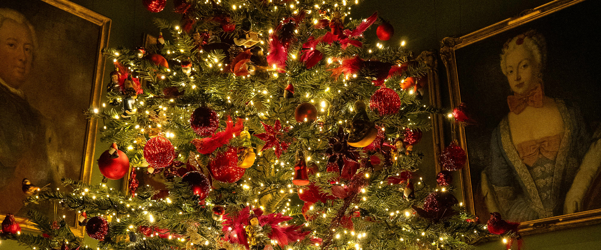 Oil Paintings Next To Christmas Tree