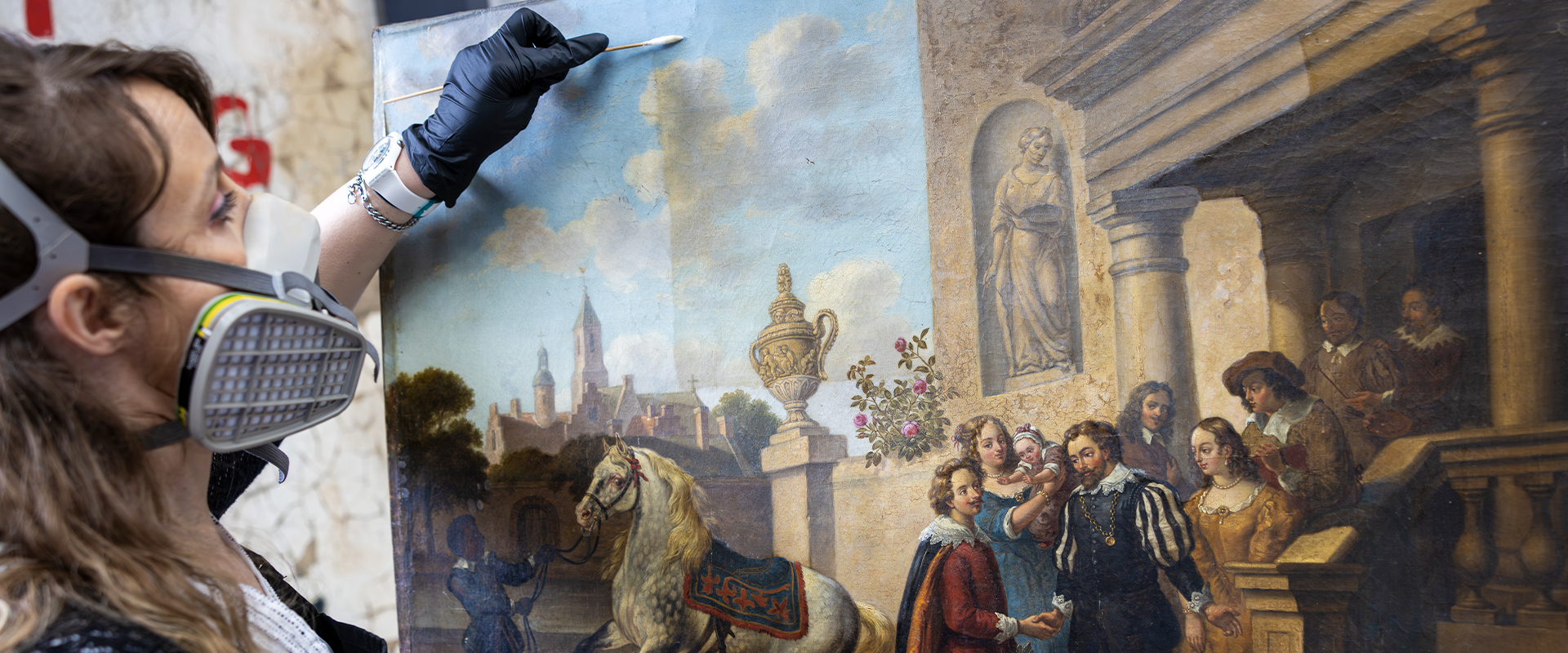 Cleaning an oil painting surface