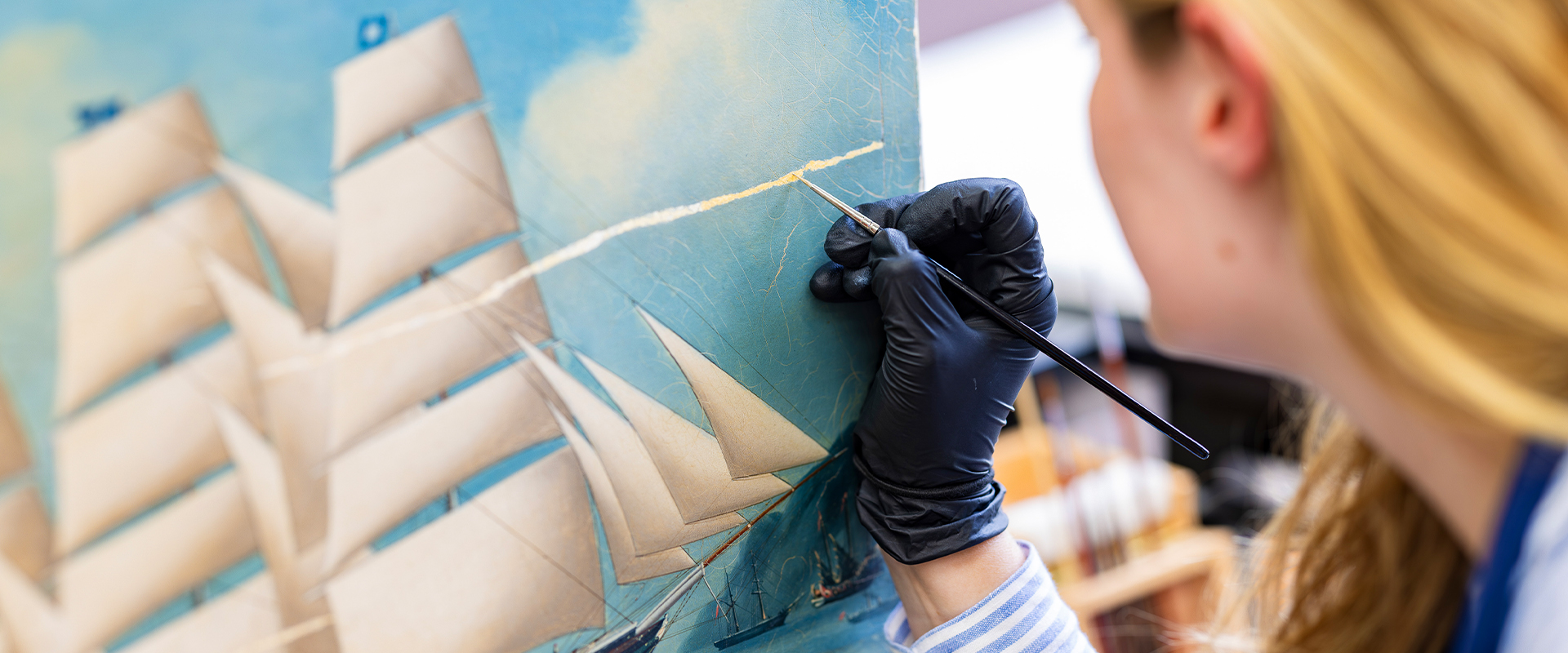 Retouching a cracked painting