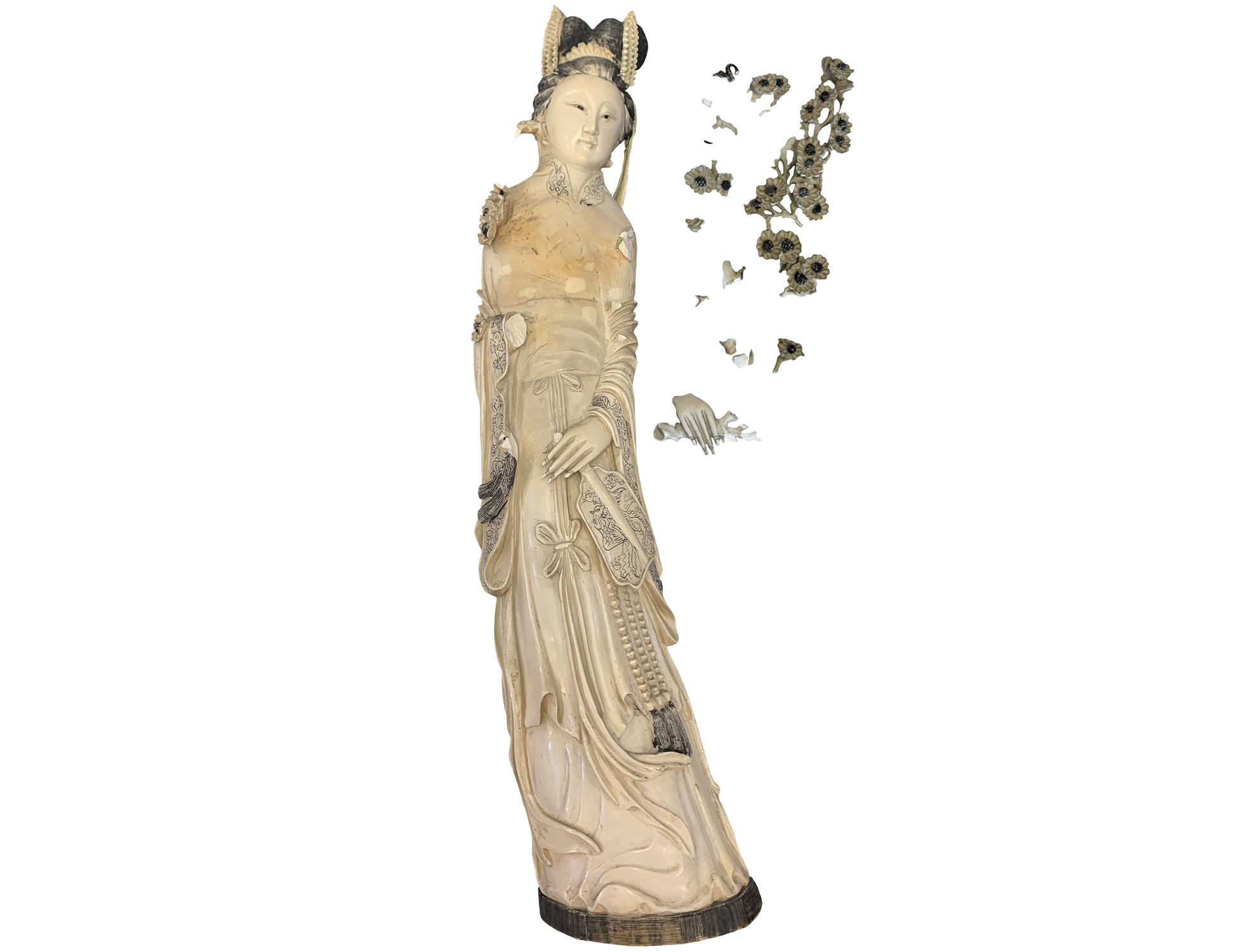 ivory Guanyin figurine before restoration